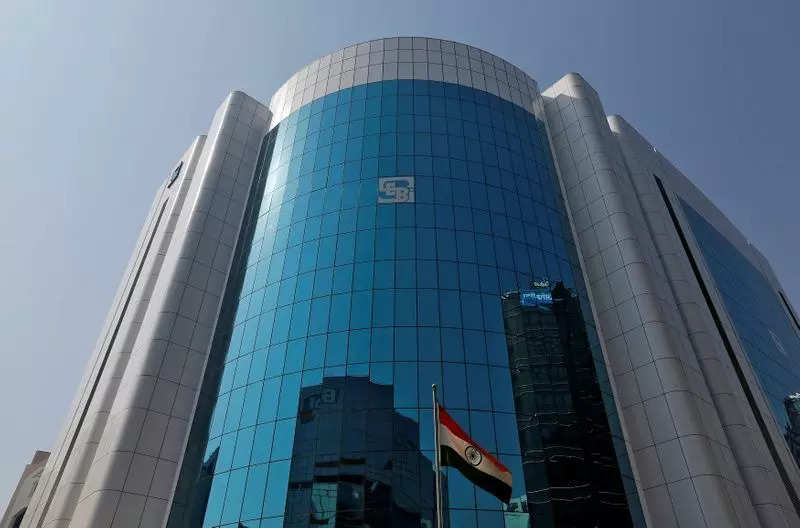 The logo of the Securities and Exchange Board of India (SEBI) is seen on the facade of its headquarters building in Mumbai